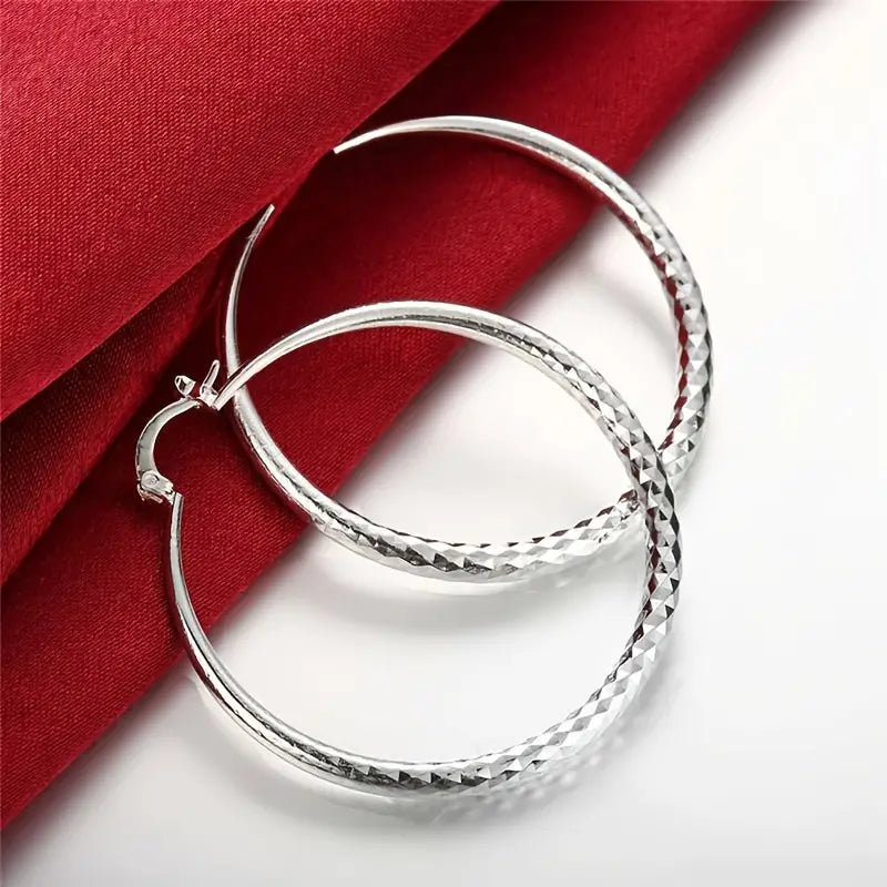 Gleaming Silver Plated Big Hoop Earrings - The Perfect Jewelry Accessory Charm for that quick put together look.