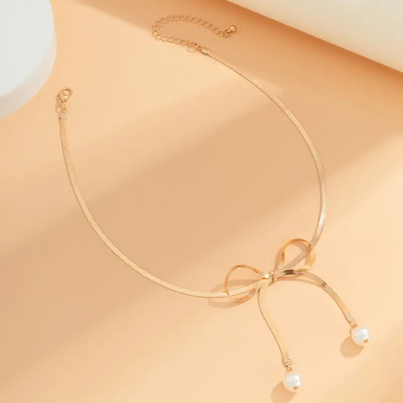 Gold Bow Charmed Necklace