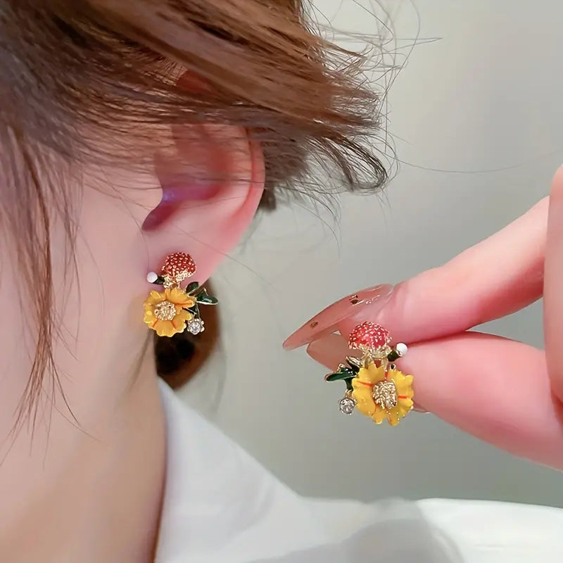 Add a Touch of Sparkle to Your Look with These Rhinestone Orange Flower Stud Earrings!