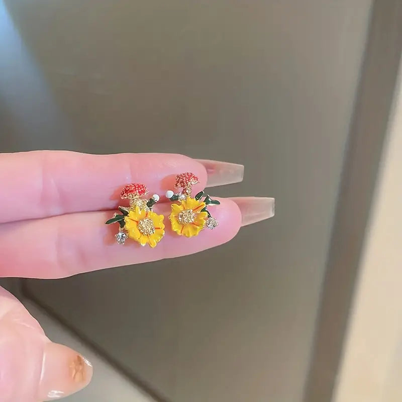 Add a Touch of Sparkle to Your Look with These Rhinestone Orange Flower Stud Earrings!