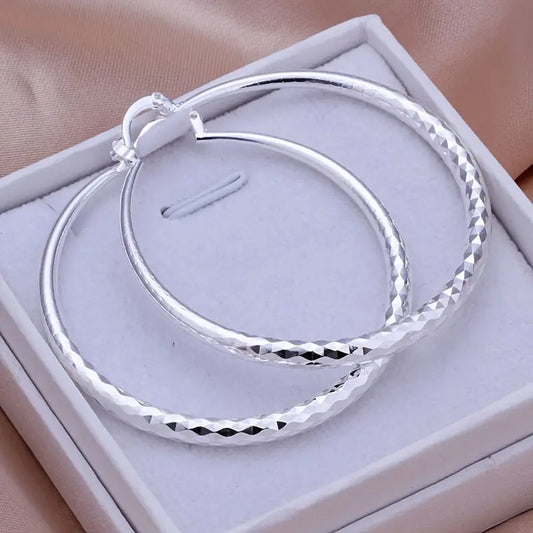 Gleaming Silver Plated Big Hoop Earrings - The Perfect Jewelry Accessory Charm for that quick put together look.